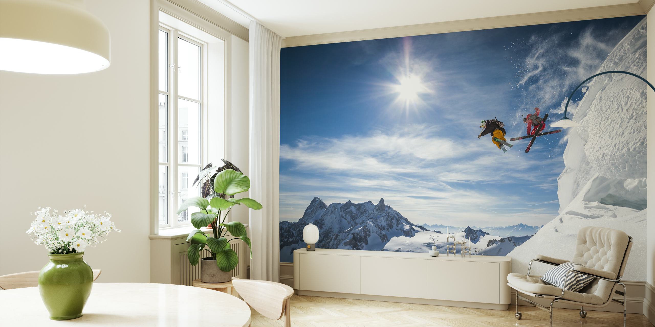 Two skiers jumping over snowy mountains with a bright blue sky, action-packed wallpaper
